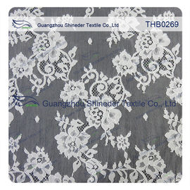 Les fleurs innombrables 3*1.5m classent le tissu de dentelle de Chantilly de nylon de 100% pour la robe de mariage fournisseur