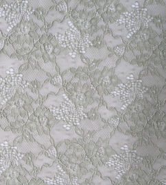 Tissu élastique de dentelle de Spandex et de nylon avec le modèle de fleur de trèfle fournisseur