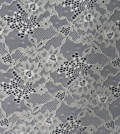 Tissu élastique de dentelle de Spandex et de nylon avec le modèle de fleur de trèfle fournisseur