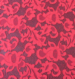 Tissu élastique rouge de dentelle de broderie de guipure de mode pour des robes de mariage fournisseur
