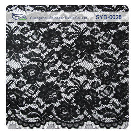 Le beau noir lourd a attaché le tissu de dentelle brodé à la robe de soirée fournisseur